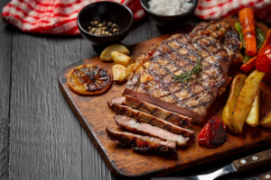 grilled-beef-steak-dark-wooden-surface_1150-44344-_1_.png